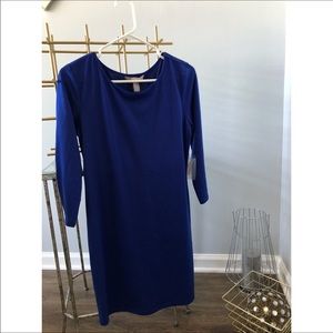 Fitted royal blue dress.